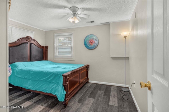 3331 Holden Beach Rd SW, Supply, NC 28462 - bedroom featuring dark wood-type flooring, a textured ceiling, baseboards, and a ceiling fan