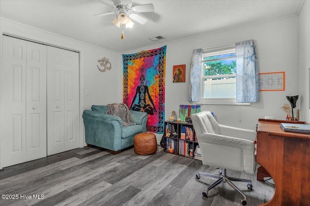 3331 Holden Beach Rd SW, Supply, NC 28462 - home office featuring wood finished floors, a textured ceiling, a ceiling fan, and crown molding