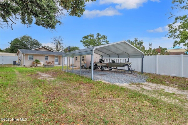 3331 Holden Beach Rd SW, Supply, NC 28462 - view of yard featuring driveway and a carport