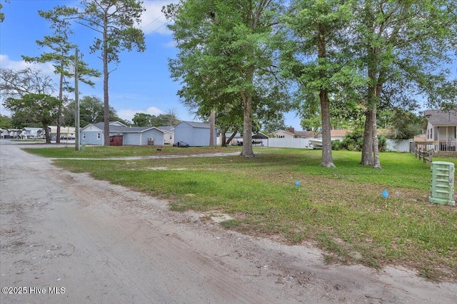 3331 Holden Beach Rd SW, Supply, NC 28462 - view of front of property with a residential view, driveway, and a garage