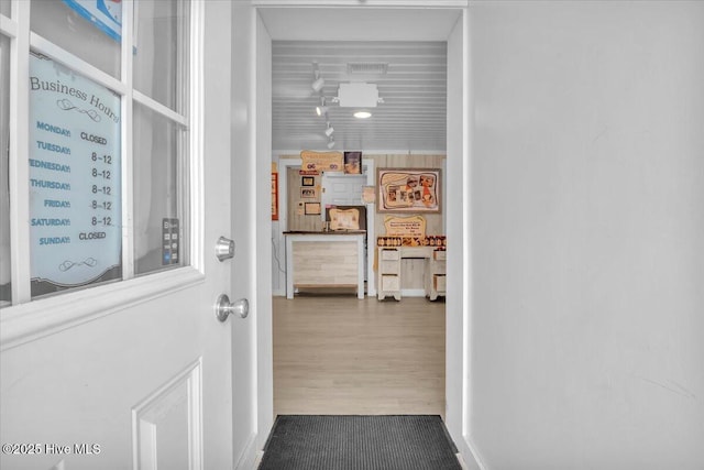 3331 Holden Beach Rd SW, Supply, NC 28462 - hallway featuring wood finished floors