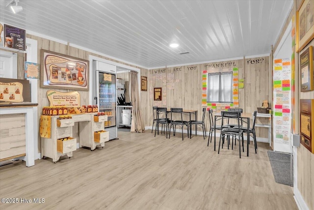 3331 Holden Beach Rd SW, Supply, NC 28462 - dining space with wood finished floors, wooden ceiling, and ornamental molding