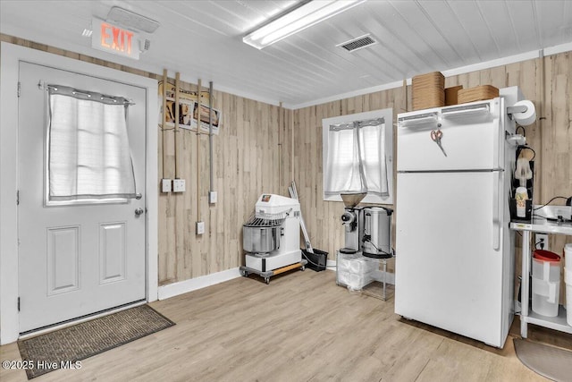 3331 Holden Beach Rd SW, Supply, NC 28462 - miscellaneous room with wood walls, light wood-style flooring, and baseboards
