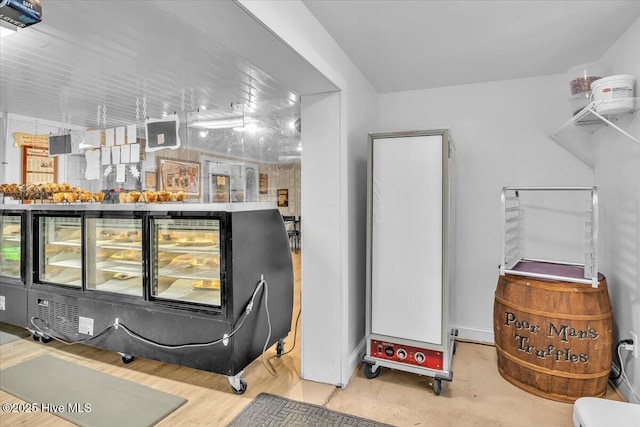3331 Holden Beach Rd SW, Supply, NC 28462 - bar area featuring wood finished floors and baseboards