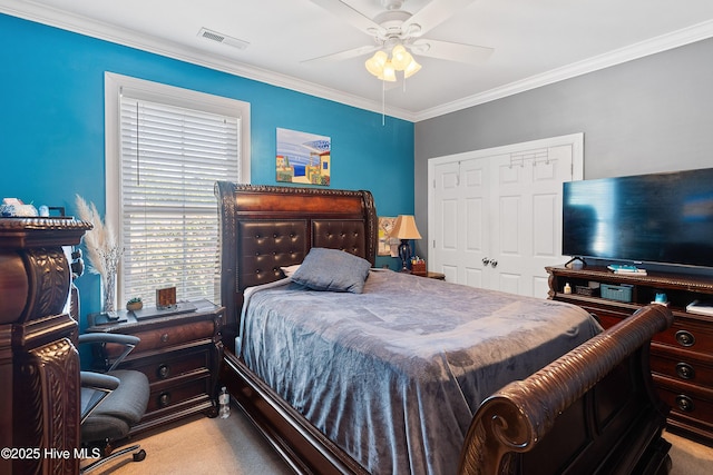 700 S 3rd St, Wilmington, NC 28401 - bedroom featuring carpet flooring, crown molding, a closet, and a ceiling fan