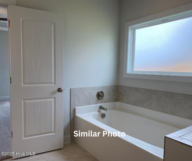 635 Indigo Johnston Dr, Jacksonville, NC 28546 - full bath with a bath and tile patterned flooring
