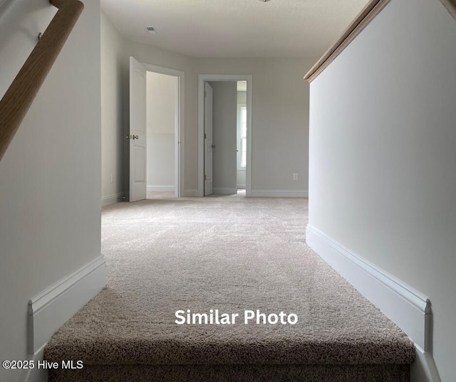 635 Indigo Johnston Dr, Jacksonville, NC 28546 - unfurnished room featuring light colored carpet and baseboards