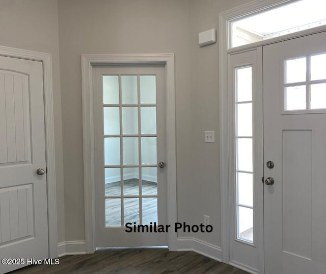635 Indigo Johnston Dr, Jacksonville, NC 28546 - entryway with baseboards and dark wood-style flooring