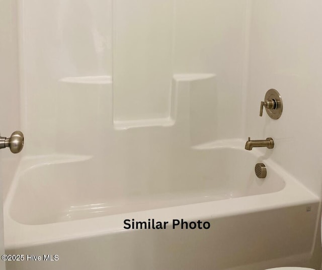 635 Indigo Johnston Dr, Jacksonville, NC 28546 - bathroom featuring  shower combination