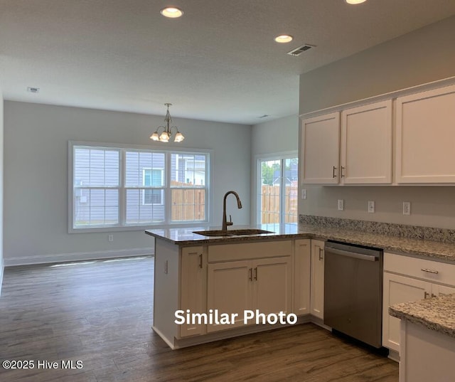 635 Indigo Johnston Dr, Jacksonville, NC 28546 - kitchen with dishwasher, a sink, a peninsula, white cabinets, and a chandelier