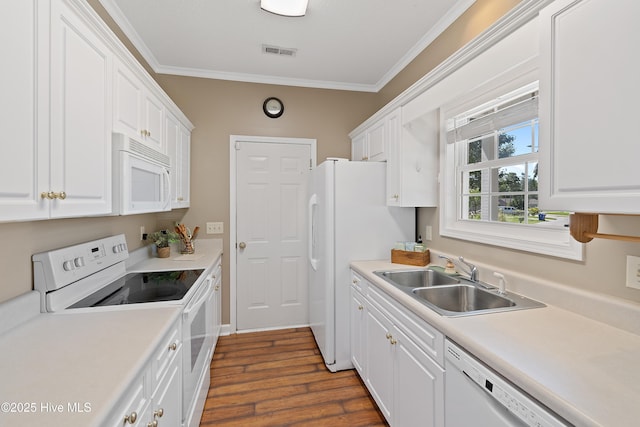 4379 Owendon Dr, Shallotte, NC 28470 - kitchen with white appliances, a sink, dark wood finished floors, white cabinets, and ornamental molding