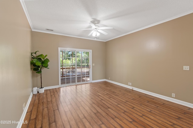 4379 Owendon Dr, Shallotte, NC 28470 - empty room with a ceiling fan, baseboards, wood finished floors, crown molding, and a textured ceiling
