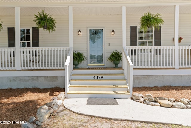 4379 Owendon Dr, Shallotte, NC 28470 - doorway to property featuring a porch