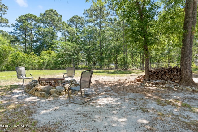 4379 Owendon Dr, Shallotte, NC 28470 - view of patio / terrace with an outdoor fire pit