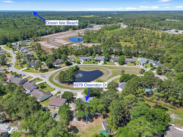 4379 Owendon Dr, Shallotte, NC 28470 - aerial overview of property's location with a forest and a large body of water