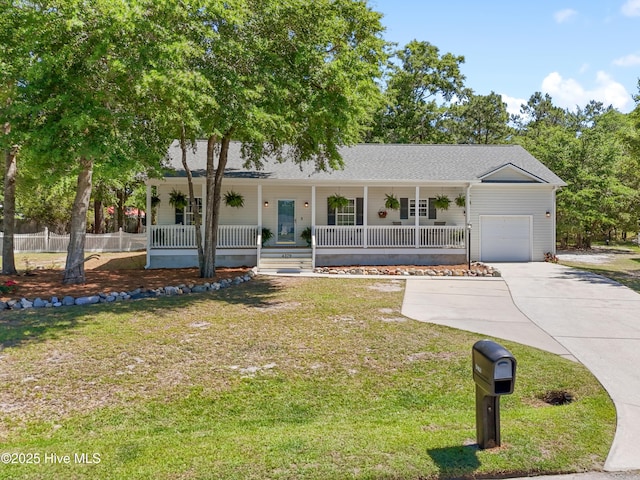4379 Owendon Dr, Shallotte, NC 28470 - ranch-style home with covered porch, an attached garage, concrete driveway, and roof with shingles