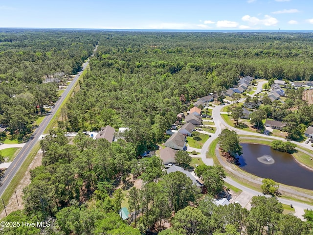 4379 Owendon Dr, Shallotte, NC 28470 - aerial overview of property's location with a forest, a large body of water, and nearby suburban area
