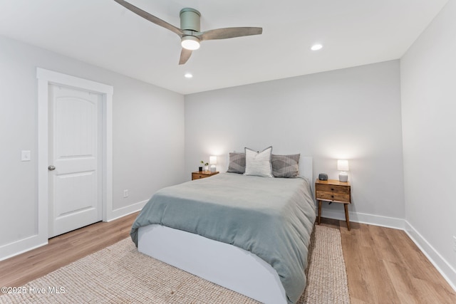 1015 E Moore St, Southport, NC 28461 - bedroom featuring light wood finished floors, baseboards, recessed lighting, and a ceiling fan