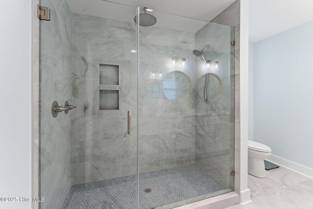 1015 E Moore St, Southport, NC 28461 - full bathroom featuring double vanity, a stall shower, and marble finish floors