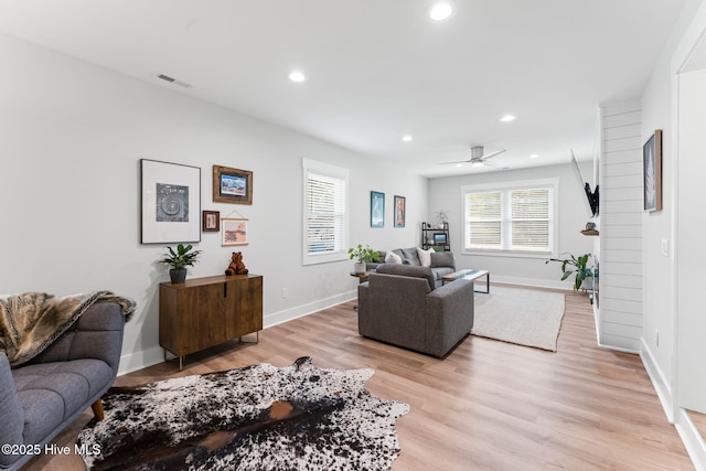 1015 E Moore St, Southport, NC 28461 - living area featuring light wood finished floors, recessed lighting, ceiling fan, and baseboards