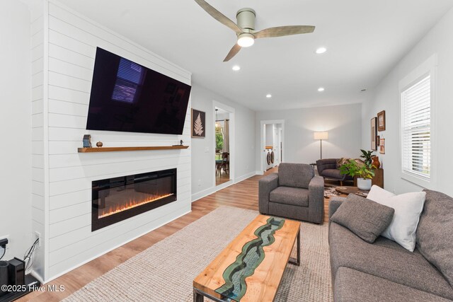 1015 E Moore St, Southport, NC 28461 - living area featuring light wood finished floors, recessed lighting, and ceiling fan
