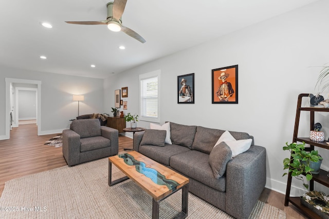 1015 E Moore St, Southport, NC 28461 - living room featuring wood finished floors, baseboards, a ceiling fan, and recessed lighting