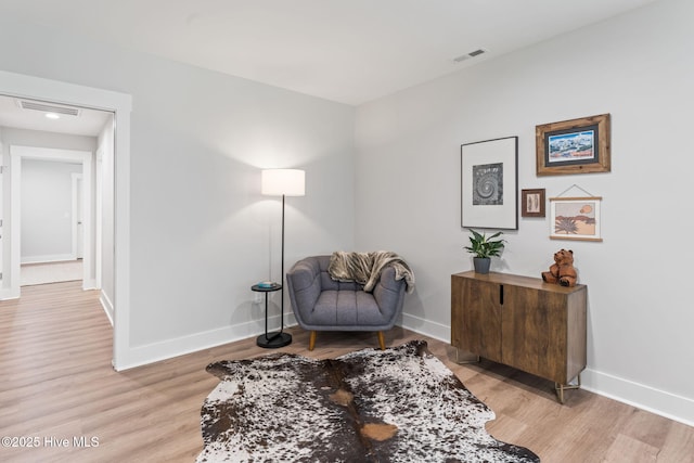 1015 E Moore St, Southport, NC 28461 - living area with light wood finished floors and baseboards