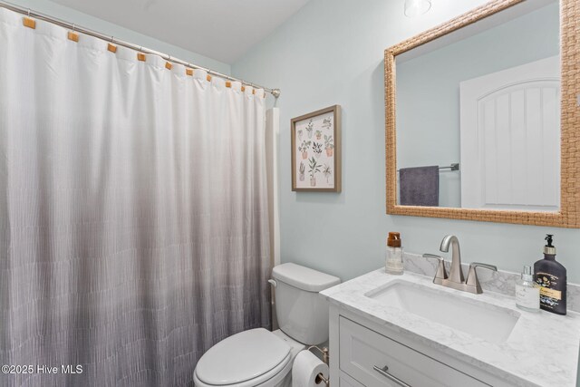1015 E Moore St, Southport, NC 28461 - bathroom with toilet and vanity