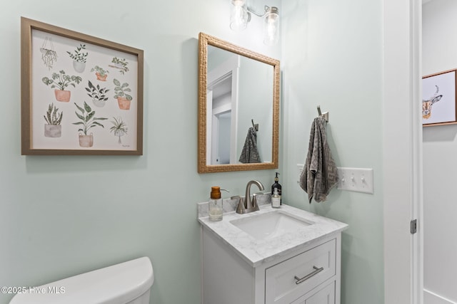 1015 E Moore St, Southport, NC 28461 - bathroom featuring vanity and toilet