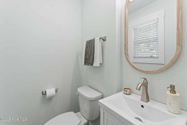 1015 E Moore St, Southport, NC 28461 - exercise room featuring baseboards and wood finished floors