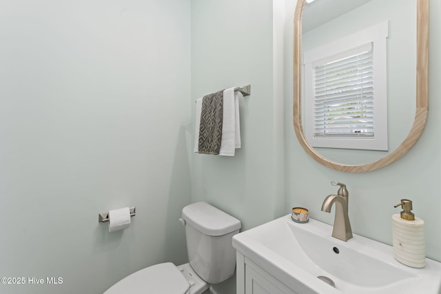 1015 E Moore St, Southport, NC 28461 - half bath featuring toilet and vanity