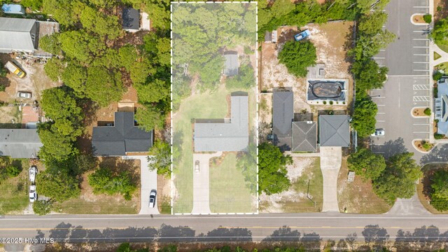 1015 E Moore St, Southport, NC 28461 - aerial overview of property's location with property boundaries highlighted and nearby suburban area