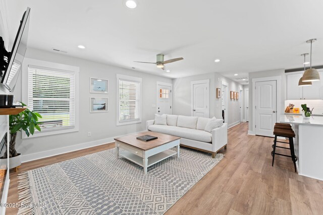 1015 E Moore St, Southport, NC 28461 - single story home with a porch, brick siding, and a front yard