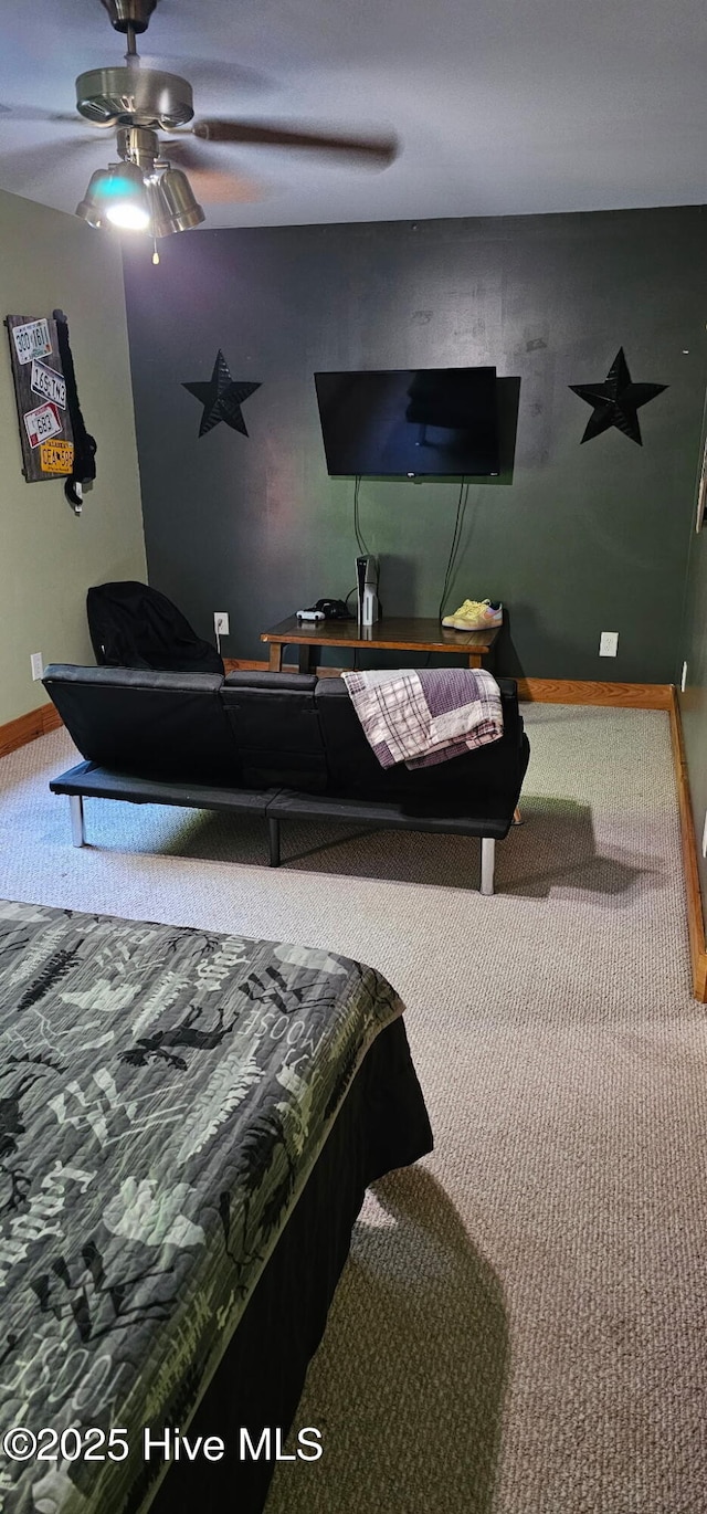 520 Holly Ridge Rd, Holly Ridge, NC 28445 - bedroom with carpet floors, baseboards, and ceiling fan