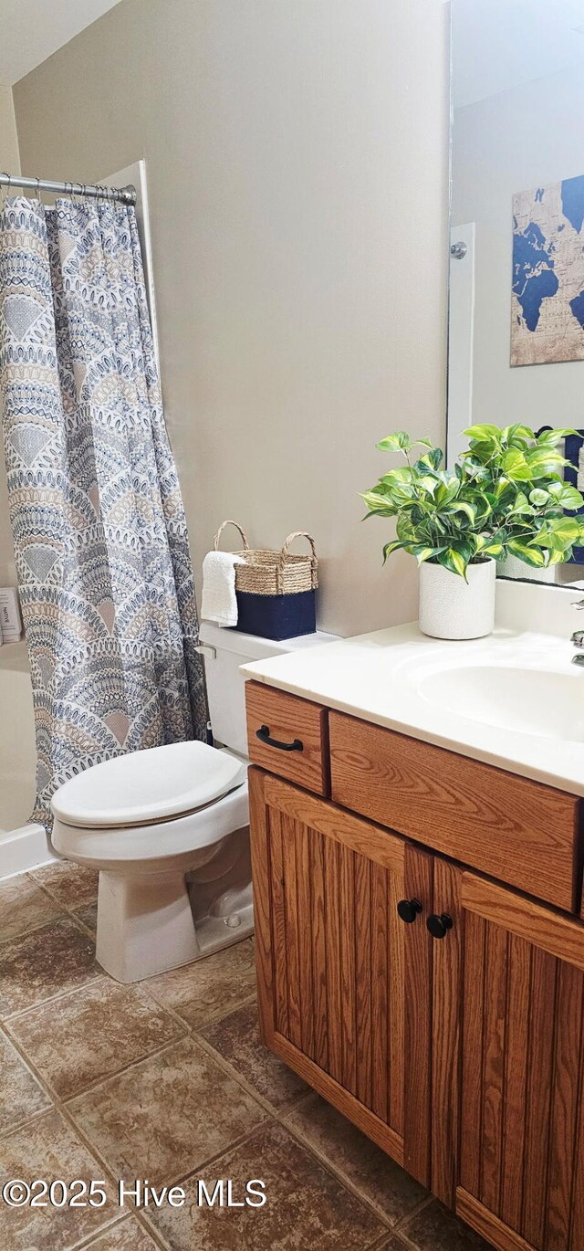 520 Holly Ridge Rd, Holly Ridge, NC 28445 - full bath featuring vanity, toilet, and curtained shower
