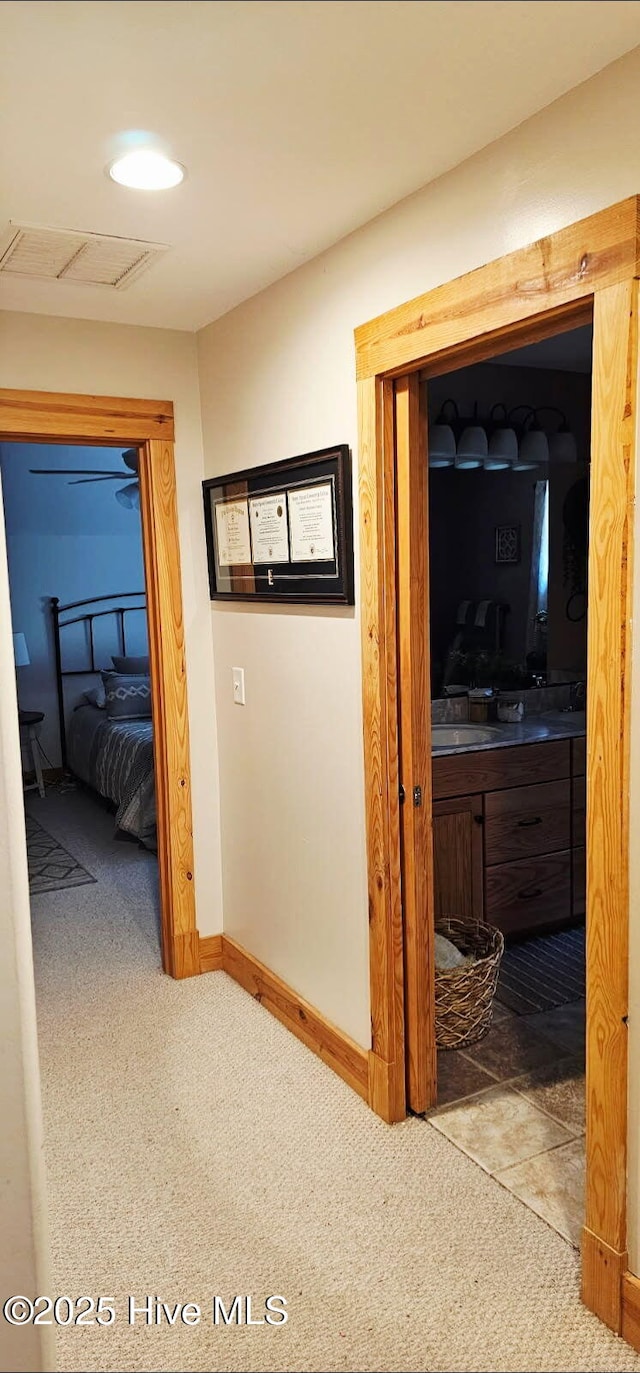 520 Holly Ridge Rd, Holly Ridge, NC 28445 - hall featuring attic access, carpet, and baseboards