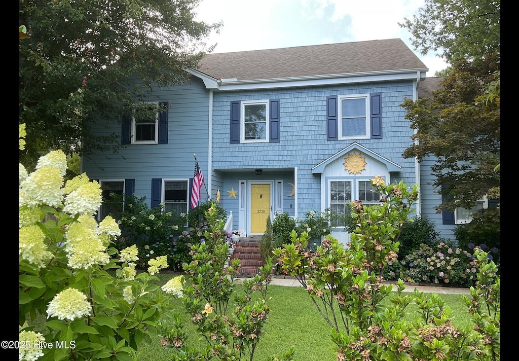 3228 Red Berry Dr, Wilmington, NC 28409 - view of front of home with a shingled roof