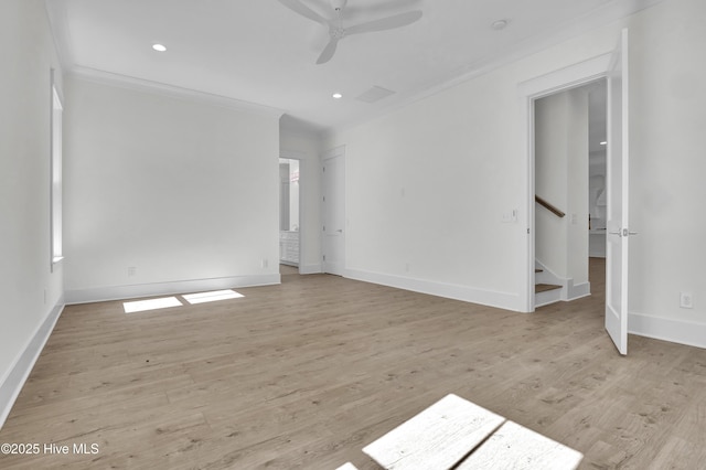 8241 Sage Valley Dr, Wilmington, NC 28411 - spare room with ornamental molding, ceiling fan, baseboards, light wood-style flooring, and stairs