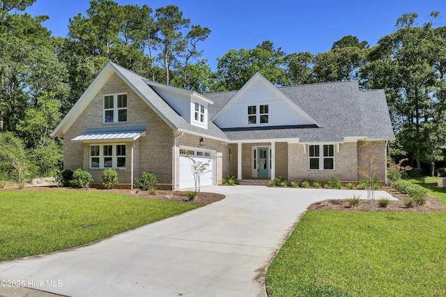 8241 Sage Valley Dr, Wilmington, NC 28411 - view of front of home featuring concrete driveway, brick siding, a front yard, an attached garage, and roof with shingles