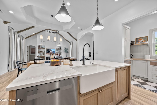 187 Royal Palms Way, Holly Ridge, NC 28445 - kitchen with arched walkways, dishwasher, a sink, hanging light fixtures, and lofted ceiling