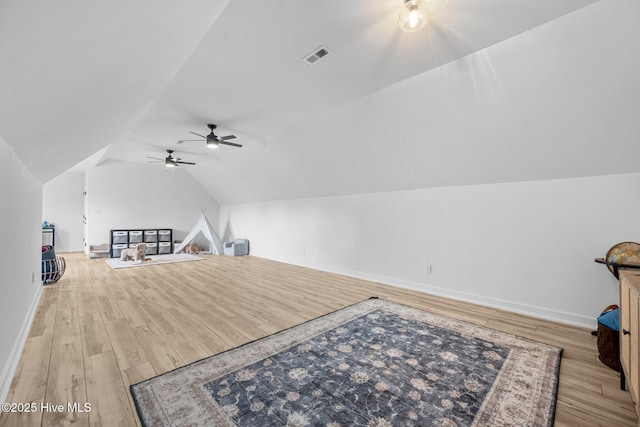 187 Royal Palms Way, Holly Ridge, NC 28445 - additional living space with wood finished floors, vaulted ceiling, a ceiling fan, and baseboards