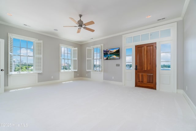 588 E Harborside Rd, Oriental, NC 28571 - foyer featuring ornamental molding, ceiling fan, carpet floors, baseboards, and recessed lighting