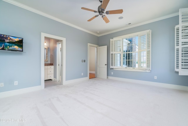 588 E Harborside Rd, Oriental, NC 28571 - unfurnished bedroom with ornamental molding, carpet flooring, baseboards, ensuite bath, and ceiling fan
