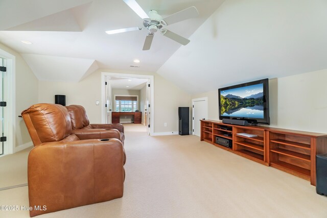 588 E Harborside Rd, Oriental, NC 28571 - carpeted living area with lofted ceiling, a ceiling fan, and baseboards