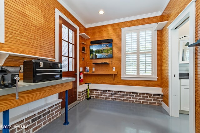 588 E Harborside Rd, Oriental, NC 28571 - miscellaneous room featuring healthy amount of natural light, ornamental molding, and concrete floors