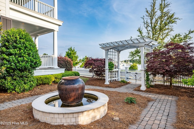 588 E Harborside Rd, Oriental, NC 28571 - view of yard with a gate, a balcony, and a pergola