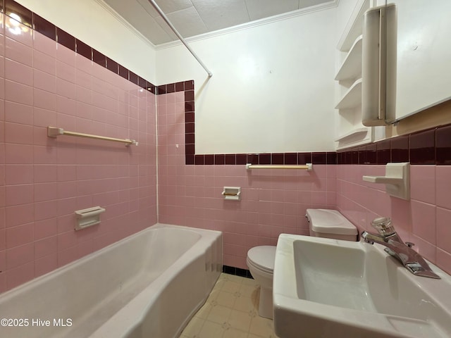 1700 Green Springs Rd, New Bern, NC 28560 - full bathroom with a sink, toilet, crown molding, tile walls, and tile patterned floors