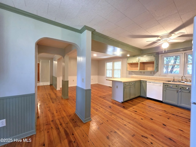 1700 Green Springs Rd, New Bern, NC 28560 - kitchen featuring dishwasher, a sink, ornamental molding, gray cabinets, and arched walkways