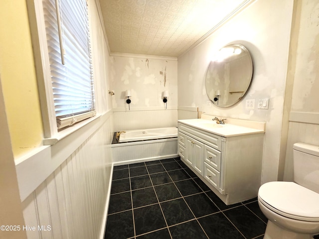 1700 Green Springs Rd, New Bern, NC 28560 - bathroom featuring a garden tub, toilet, vanity, tile patterned flooring, and crown molding