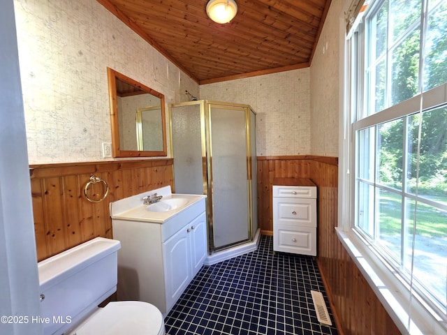 1700 Green Springs Rd, New Bern, NC 28560 - bathroom with wainscoting, vanity, wood walls, a stall shower, and wood ceiling